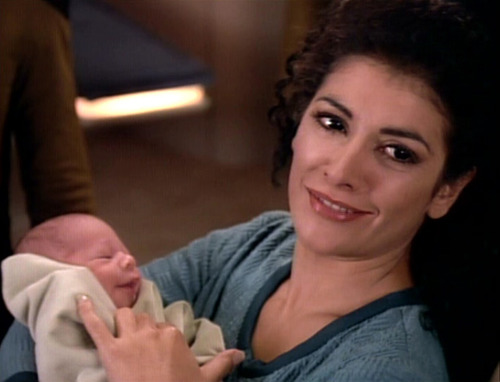 Deanna Troi holding her new baby