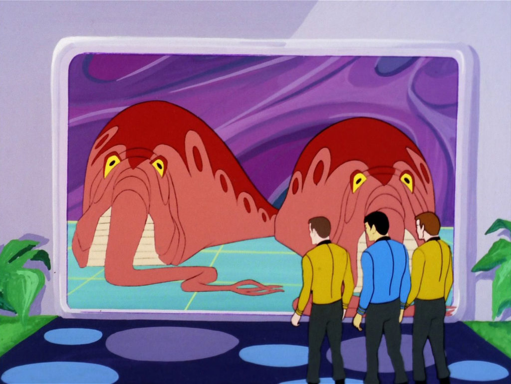 The Enterprise crew look at the Lactrans in "The Eye of the Beholder"
